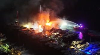 Image for Fire sinks three yachts at Mosman marina